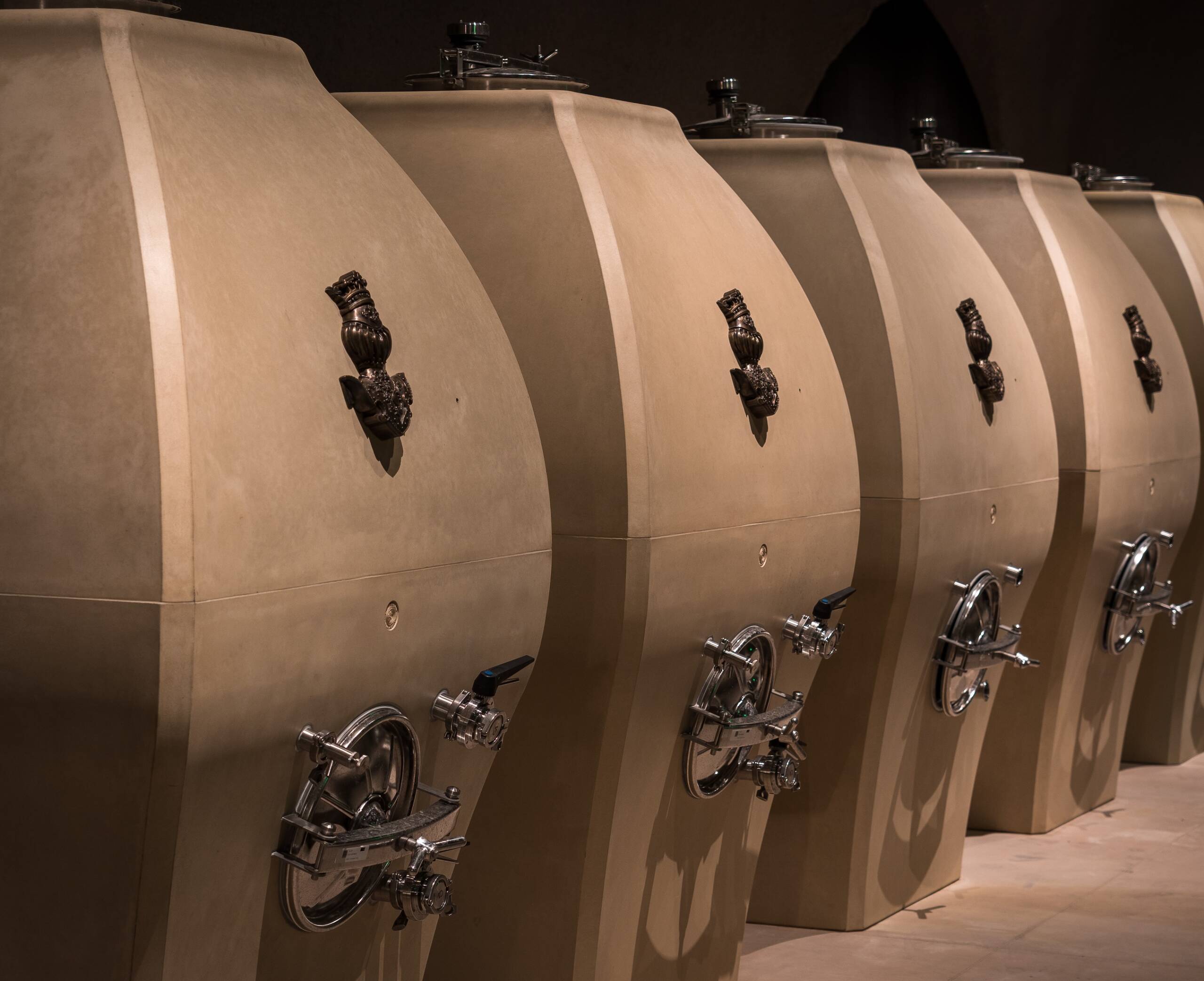 row of concrete fermentation tanks