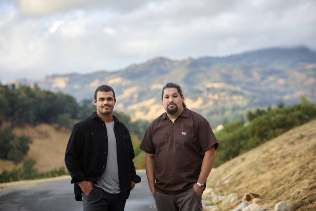 Derek & Rafael standing outdoors