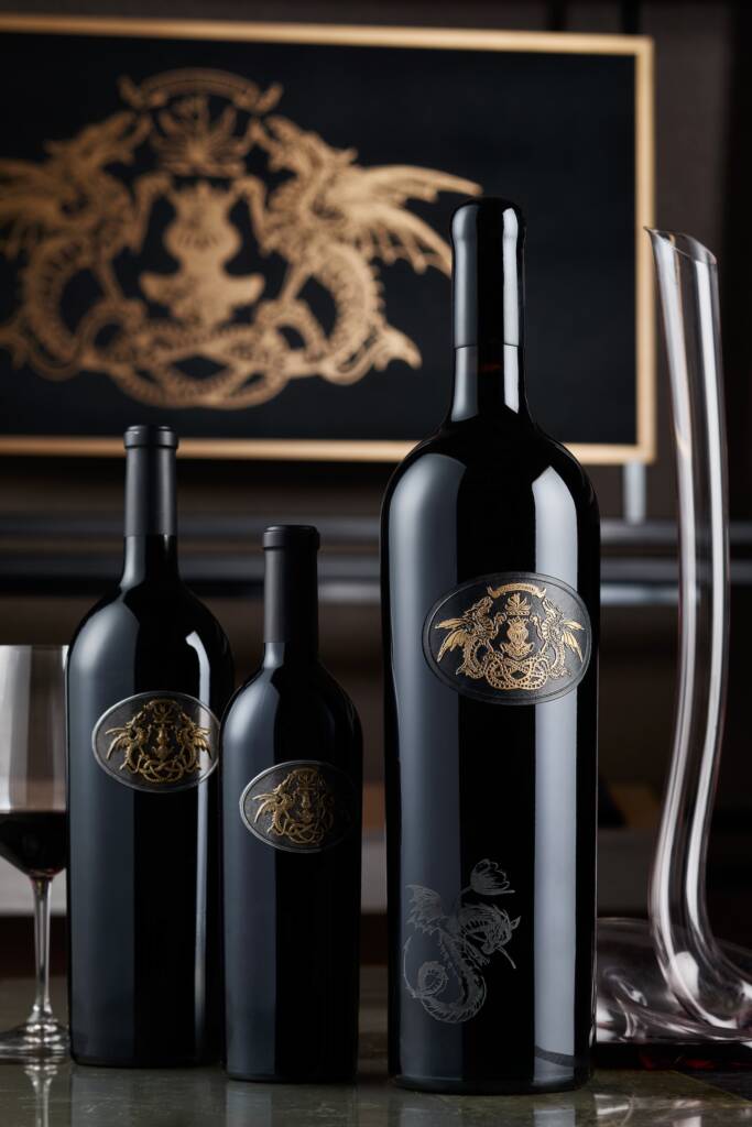 3 sizes of Draco Dormiere bottles with tall decanter.